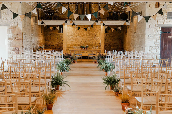 A Barn Wedding with Lush Greenery and Warm Autumnal Hues - Verity & James’ Wedding  at The Great Tythe Barn, Tetbury - Sprouts of Bristol