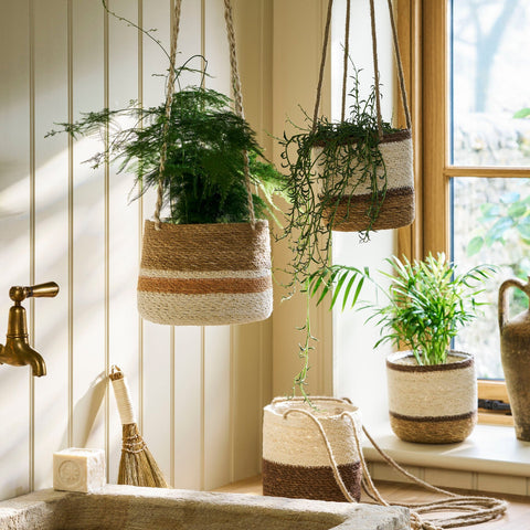 woven hanging plant holder Woven Hanging Plant Pot in Antique Brown